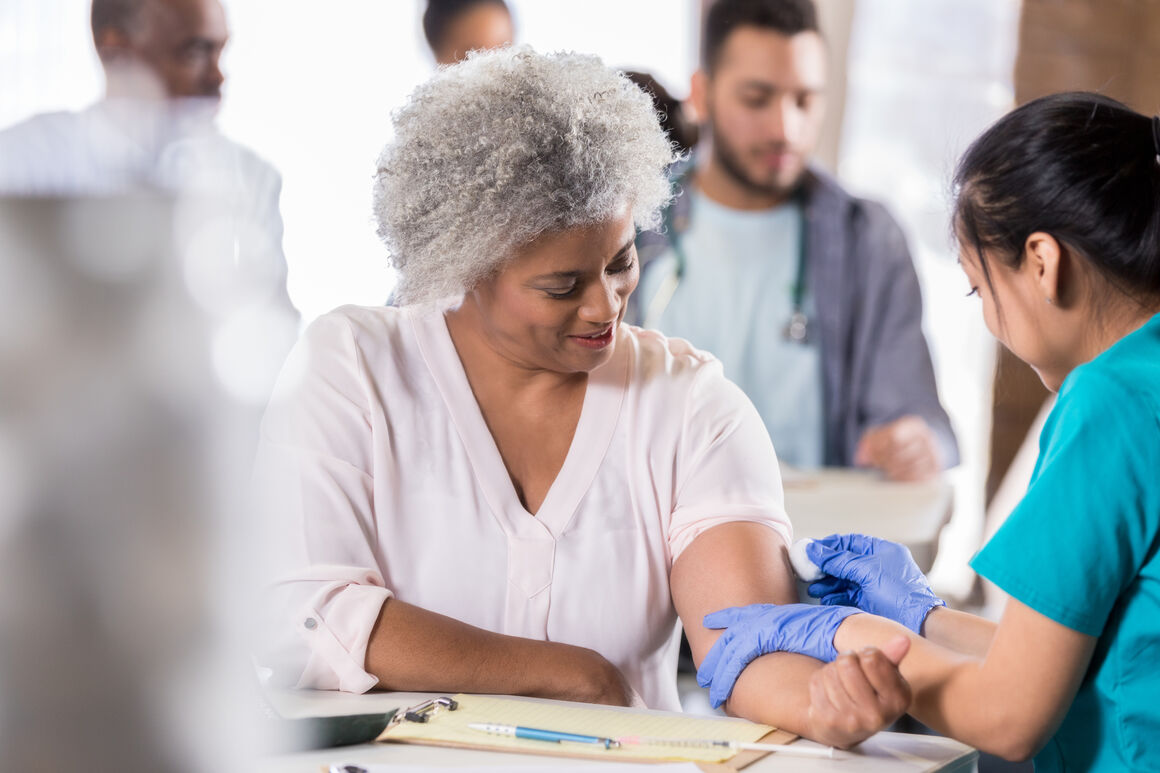 woman being vaccinated